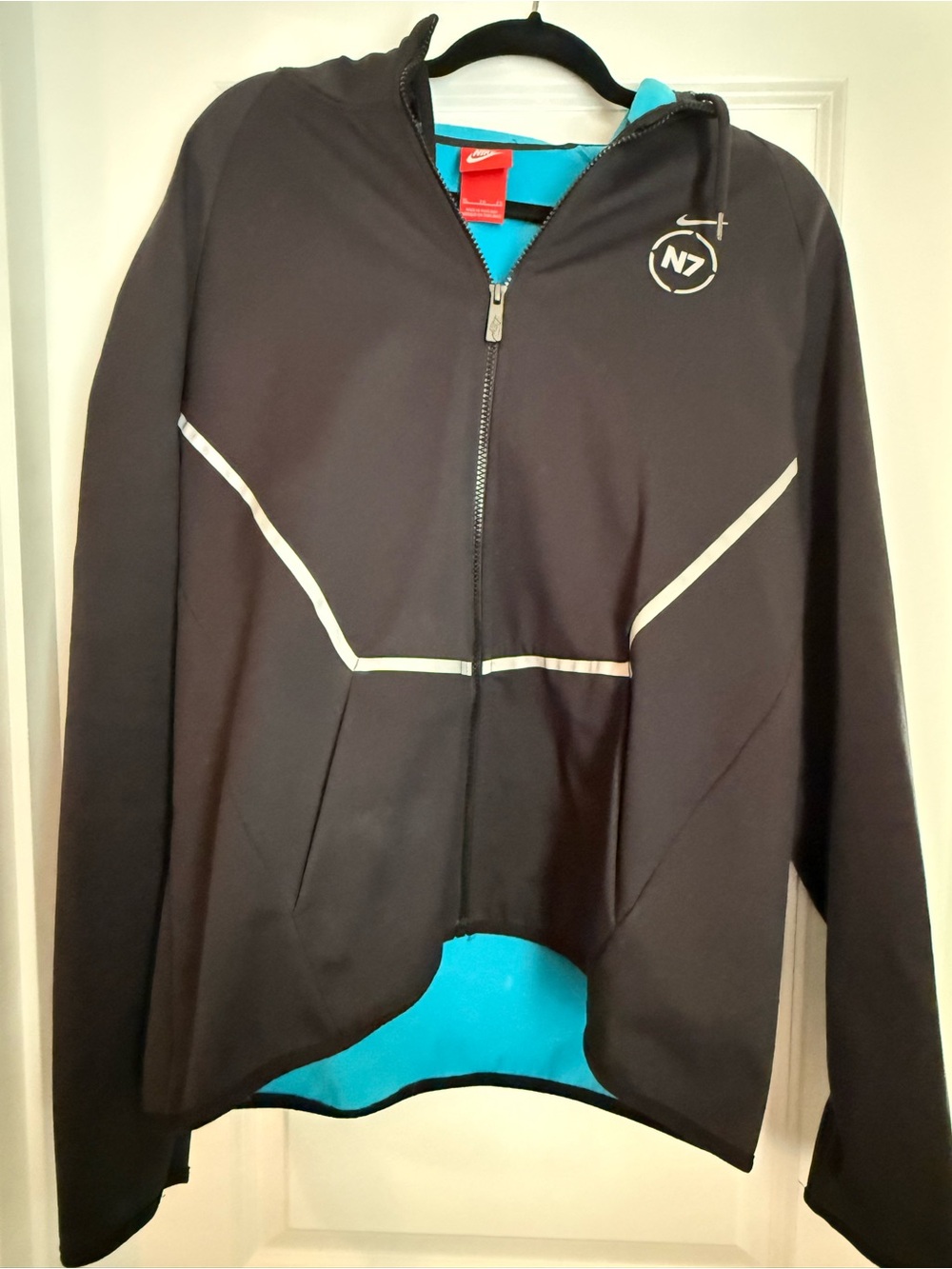 Nike Men’s Black Lightweight Zip Jacket with Teal Interior